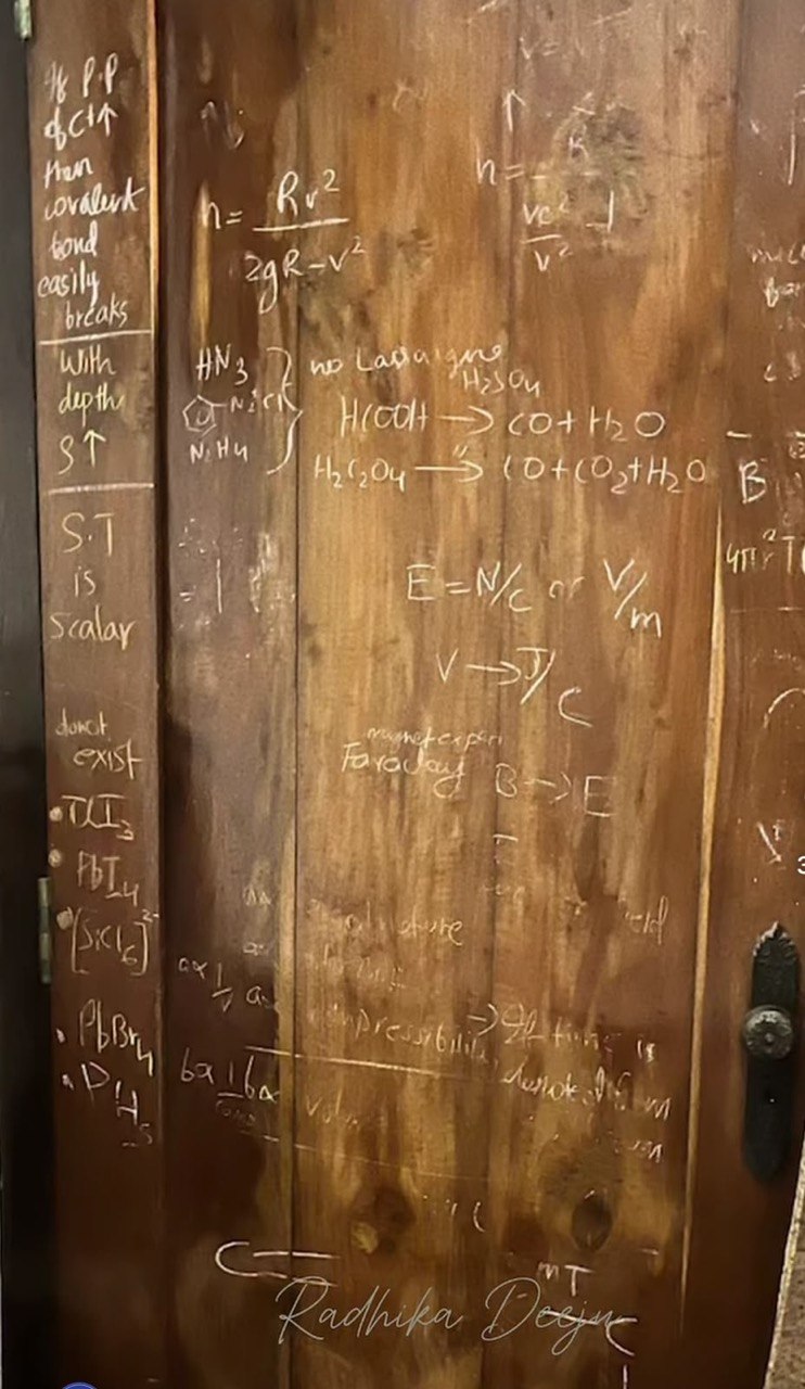 Formulas written on Radhika's cupboard