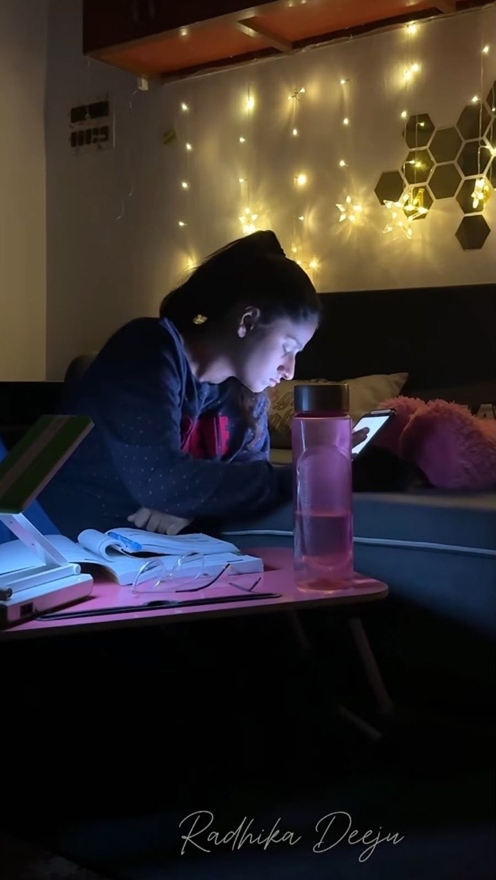 Radhika studying late night